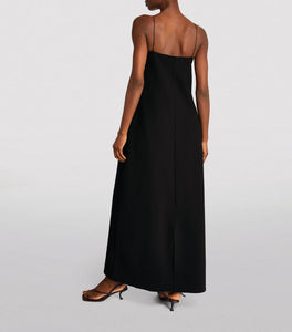 Effortlessly elegant, the Cenoa Maxi Dress from THE ROW is the perfect spring/summer staple. Designed with thin shoulder straps and a tall, floor length silhouette, this dress exudes an old money style that is both timeless and chic. A must-have for any wardrobe, the Cenoa Slip Dress offers versatile fashion for any occasion.