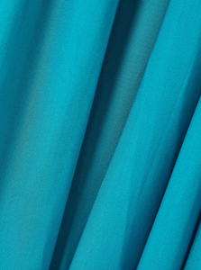 Experience the elegance of Christopher Esber’s Gyre dress, a stunning blend of volume and fluidity. Crafted from soft jersey, this maxi dress features a graceful cape-effect overlay and a bandeau bodice that cascades to a floor-length hem, creating effortless movement. Its vibrant turquoise hue draws attention, while the design’s delicate draping highlights your silhouette. Perfectly paired with silver jewelry, this statement piece embodies refined sophistication for any special occasion.