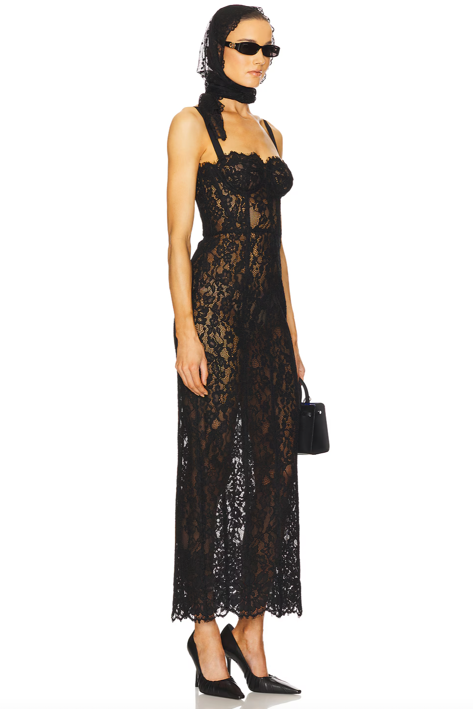 The Lace Column Dress by Helsa combines refined craftsmanship with daring elegance. Its delicate bustier and adjustable shoulder straps allow for a tailored fit, while the unlined, sheer fabric provides breathable comfort and a subtle reveal beneath. Featuring a hidden back zipper, this dress maintains a seamless silhouette, making it an ideal choice for sophisticated occasions where understated allure is key.
