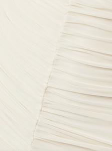 Magda Butrym's dress is underpinned with a built-in bodysuit that adds coverage to the otherwise sheer design. It's made from stretch-mesh that's intricately ruched throughout and has a ruffled neckline fitted with boning to keep its wavy shape. Complete your outfit with equally feminine accessories.