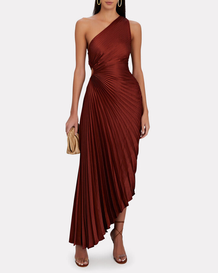 Indulge in effortless elegance with the Robe Delfina One-Shoulder Plisse Maxi Dress. This stunning dress features a one-shoulder design and delicate plisse detailing, exuding sophistication and exclusivity. Made from luxurious materials, this dress is perfect for any special occasion, effortlessly elevating your style and making you stand out among the crowd.