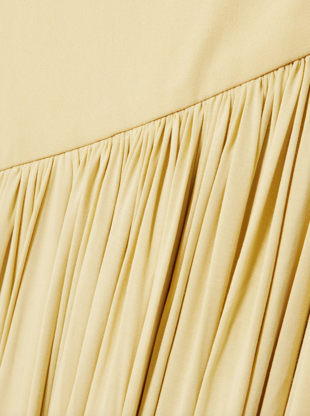 Discover effortless elegance with the Gwen Asymmetric Draped Jersey Dress by Abadia. Crafted from luxuriously soft stretch-bamboo fabric, this stunning piece features a sophisticated one-shoulder design that flatters every frame. Artfully draped details flow gracefully from the fitted top through the skirt, creating a silhouette that's both modern and timelessly chic. 