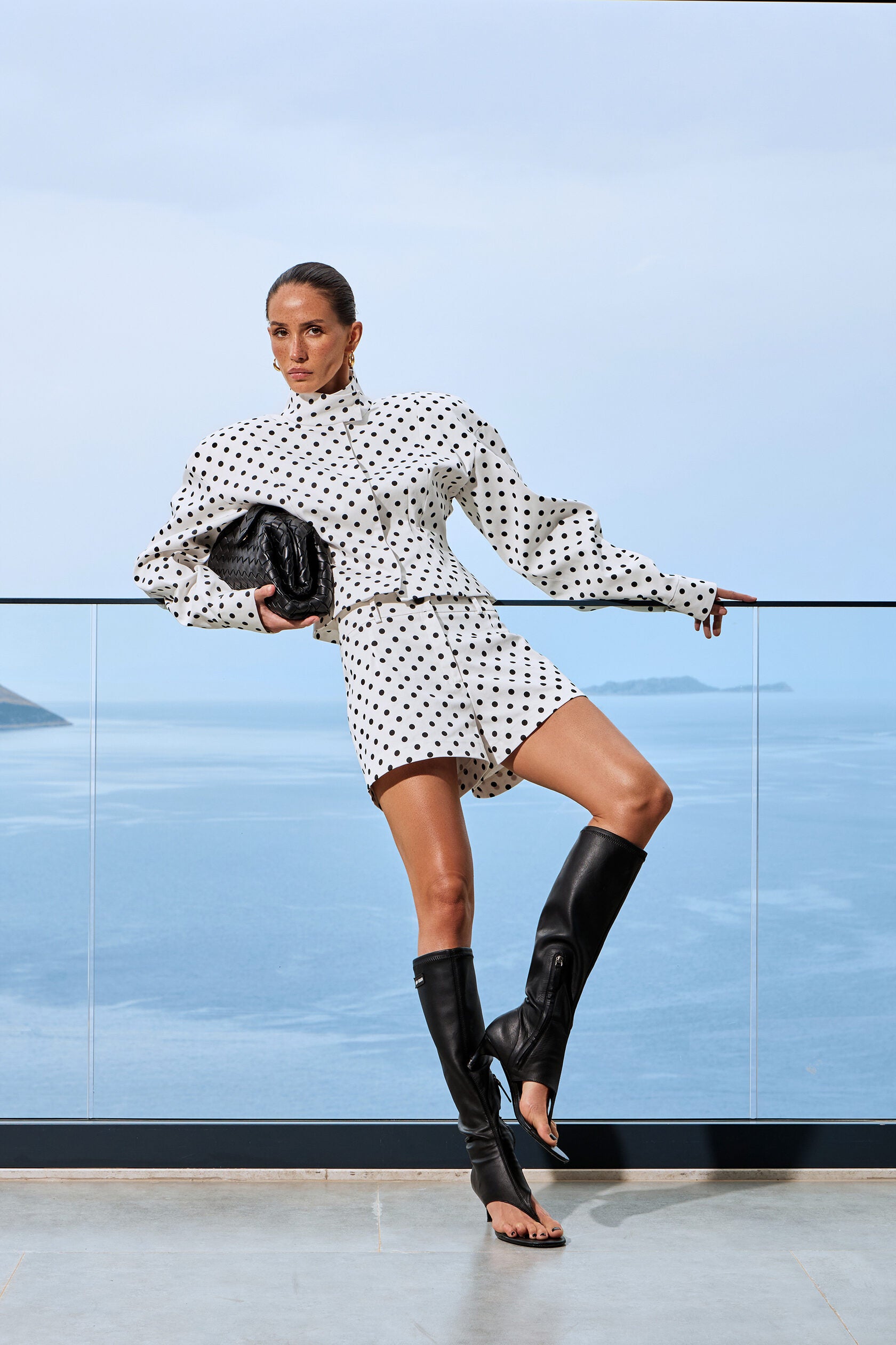 Elevate your casual wardrobe with the Delilah Jacket, a striking two-piece polka dot set that effortlessly blends style and comfort. Featuring a commanding stand collar jacket paired with coordinating shorts, this ensemble delivers the perfect balance of relaxed sophistication and contemporary edge. Long sleeves and a thoughtfully relaxed silhouette create an undeniably chic silhouette that works as hard as you do—whether you're running weekend errands or stepping out for an evening. 