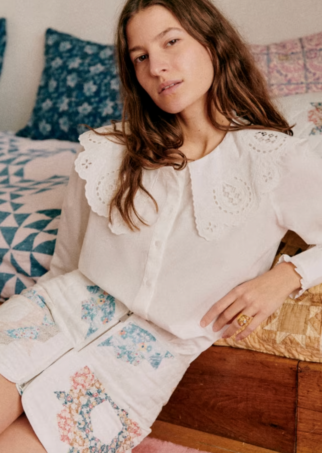 The Flavie Shirt by Sezane combines timeless elegance with a standout design featuring a large embroidered collar that adds a touch of sophistication to your look. Its long sleeves and buttoned front offer both comfort and versatility, making it perfect for dressing up or down. Elevate your wardrobe with this statement piece that effortlessly blends classic style and unique detail.