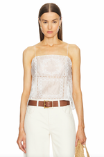 Load image into Gallery viewer, Stay cool and stylish with the Handkerchief Camisole by HELSA. Featuring shoulder strap tie closures and side slits, this cami is made of linen fabric with eyelets and embroidered florals. Its intentionally sheer design allows you to show off your favorite undergarments. Perfect for any occasion, this camisole is a must-have for your wardrobe.
