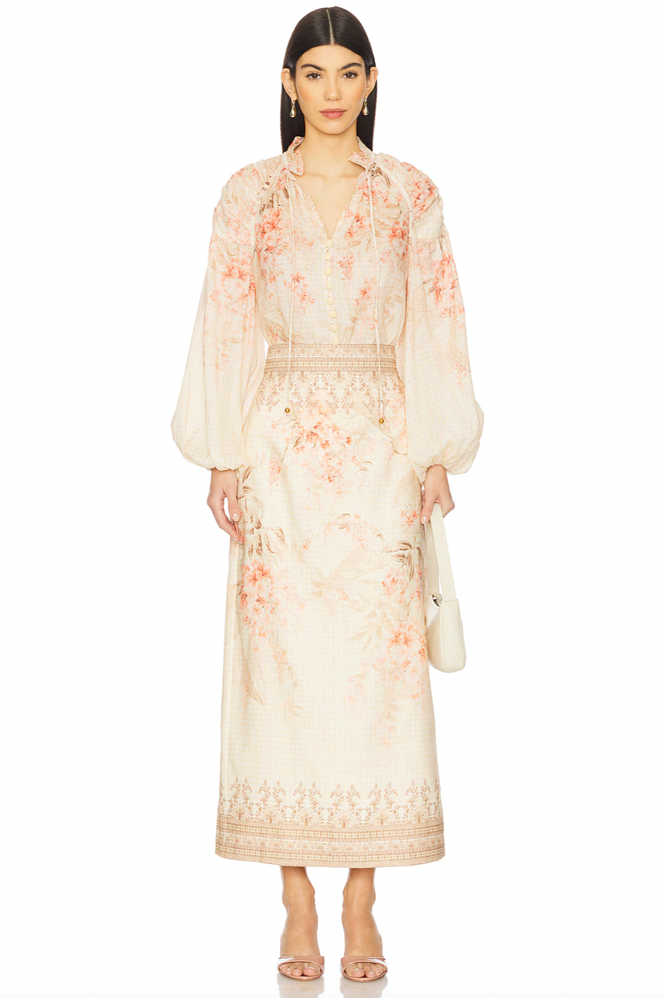 Elevate your wardrobe with the Illuminate Midi Skirt by Zimmermann, crafted from breathable linen for comfort and style. Designed with a high-waisted fit and a hidden back zipper, it offers a sleek silhouette and easy wear. Fully lined for a smooth finish, this skirt combines elegance with effortless sophistication, perfect for any occasion. Dry clean only to maintain its pristine quality.