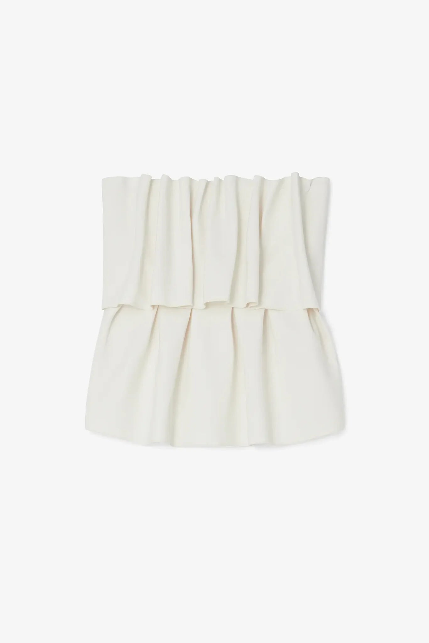 Introducing the Sculpted Tube Top by House of Dagmar - the perfect blend of elegance and sustainability! This sleeveless top features a sculpted, figure-hugging fit and a draped design, making it the ideal choice for dressier occasions. Add a touch of style and conscience to your wardrobe with this must-have top.