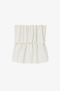 Introducing the Sculpted Tube Top by House of Dagmar - the perfect blend of elegance and sustainability! This sleeveless top features a sculpted, figure-hugging fit and a draped design, making it the ideal choice for dressier occasions. Add a touch of style and conscience to your wardrobe with this must-have top.