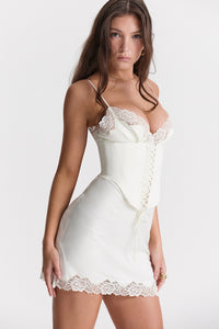 Cut from our luxurious ultra luxe satin, 'Soraya' is our delicate and dainty slip dress that transitions into a waist cinching fit thanks to the detachable corset. Wear it with or without depending on your vibe. The slender shoulder straps are adjustable and it has a sexy plunge neckline. We love the side split and pretty lace edging to the soft cups and hem to finish off this ultra feminine creation. It has a zip to the back for easy on.