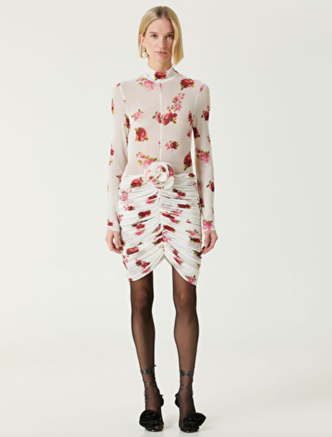 Elevate your wardrobe with the Printed Jersey Mini Dress by Magda Butrym, featuring delicate rose appliqués that add a touch of romance. Crafted from soft, comfortable jersey fabric, this dress offers a flattering fit enhanced by elegant draped panels at the hem. Its unique all-over print ensures no two pieces are exactly alike, letting you stand out with effortless sophistication. Perfect for daytime events or chic evenings, this mini dress combines style and comfort seamlessly.
