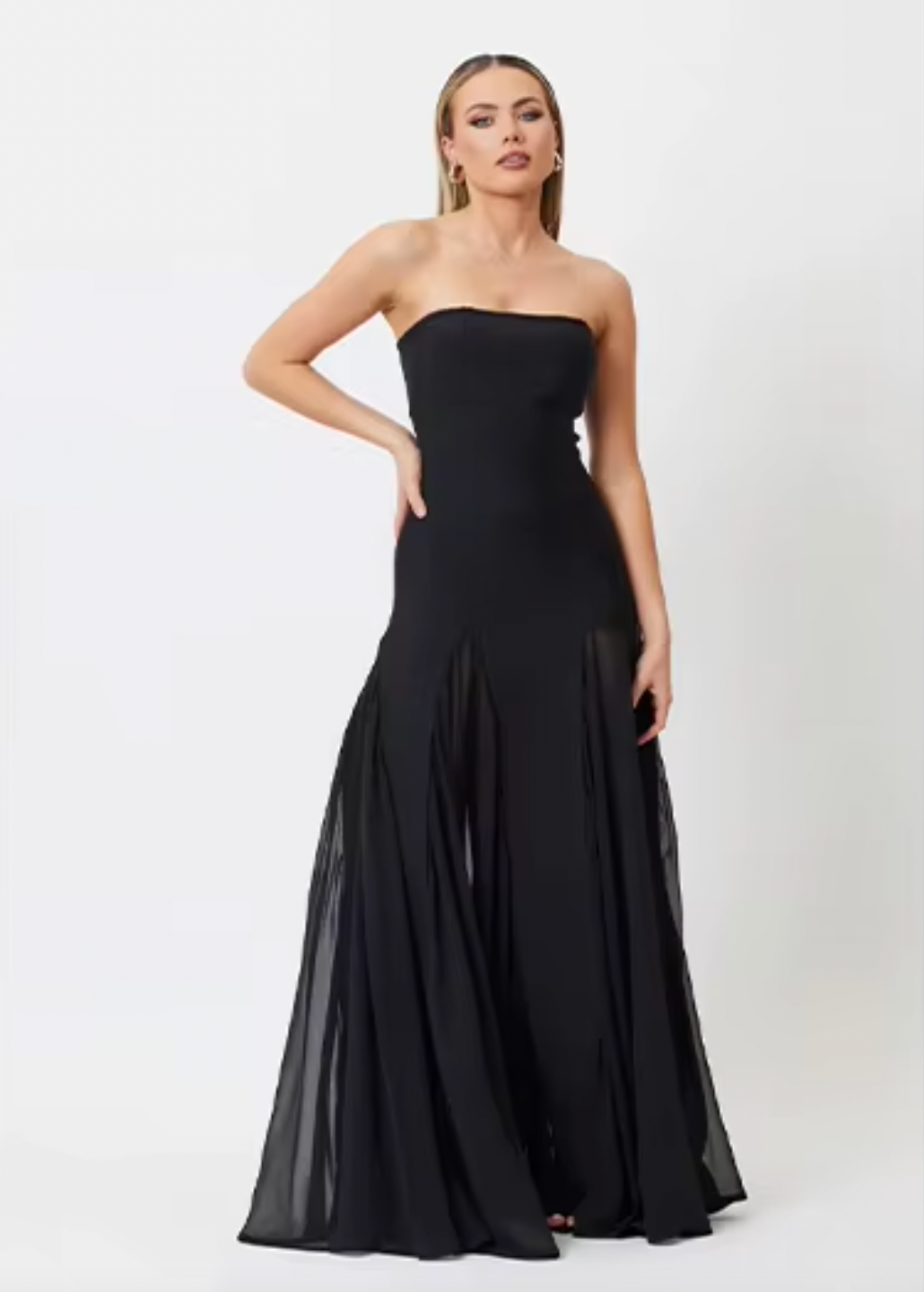 Introducing the Bridget Maxi Dress - the perfect blend of sophistication and comfort. Crafted with our premium crepe knit and chiffon materials, this strapless dress boasts a graceful maxi length and dynamic mesh panels for fluid movement. Featuring a convenient centre back zip closure, it's the ideal option for any event.