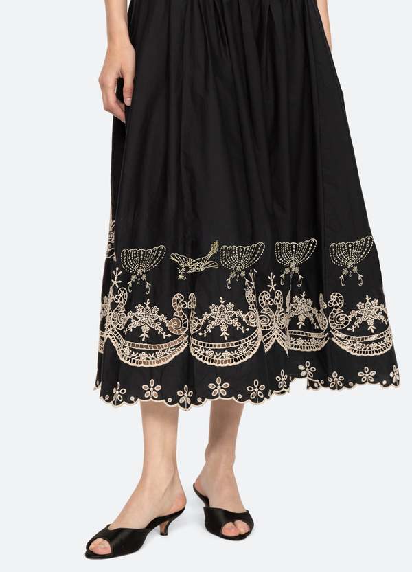 Elevate your wardrobe with the Kingsley Embroidery Tank Dress by SEA NY, designed to combine elegance and ease. Featuring intricate embroidered details, a high neckline, and a charming back bow tie, this dress offers a sophisticated silhouette. The scalloped hemline adds a delicate finishing touch, while the button back closure ensures a relaxed and comfortable fit. Perfect for any occasion, Kingsley blends timeless style with effortless charm.