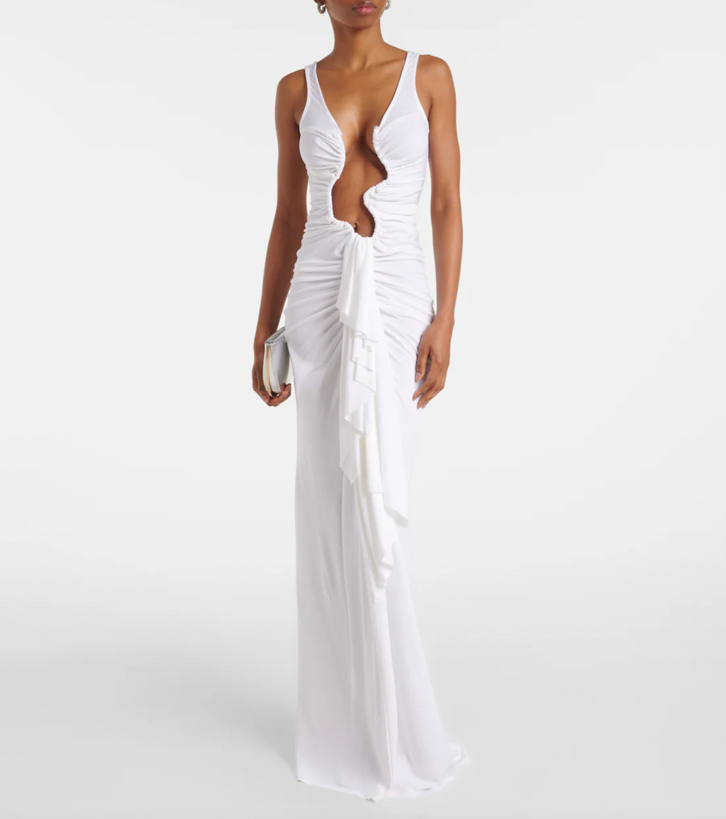 The Salacia Draped Jersey Maxi Dress by Christopher Esber epitomizes modern sophistication through its masterful construction. This luxurious jersey piece showcases architectural draping that sculpts an elegantly fluid silhouette, designed to complement and enhance every figure. The seamless marriage of premium comfort and high-fashion craftsmanship makes this dress an essential investment—equally stunning for refined daily elegance or unforgettable special moments. 