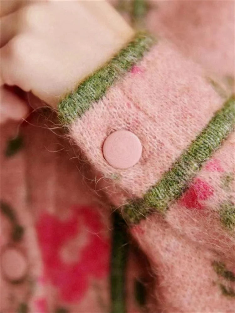 Stay cozy and stylish with our Tania Jacquard Knit Cardigan in vintage rose. Made with a wool Mohair blend, this cardigan is perfect for any chilly day. Its soft and comfortable material will keep you warm, while its vintage style adds a touch of charm to any outfit.