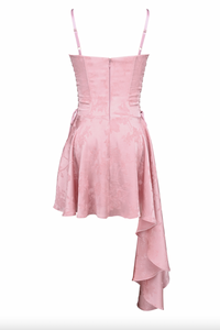 Lola Jacquard Mini Dress features exquisite pink jacquard satin crafted into a sleek mini silhouette enhanced by signature corsetry at the waist. The lace-up sides subtly define an hourglass shape while a functional back zipper ensures easy wear. Its asymmetric draped skirt adds refined drama, making Lola an expert choice for elegant evenings and romantic occasions.