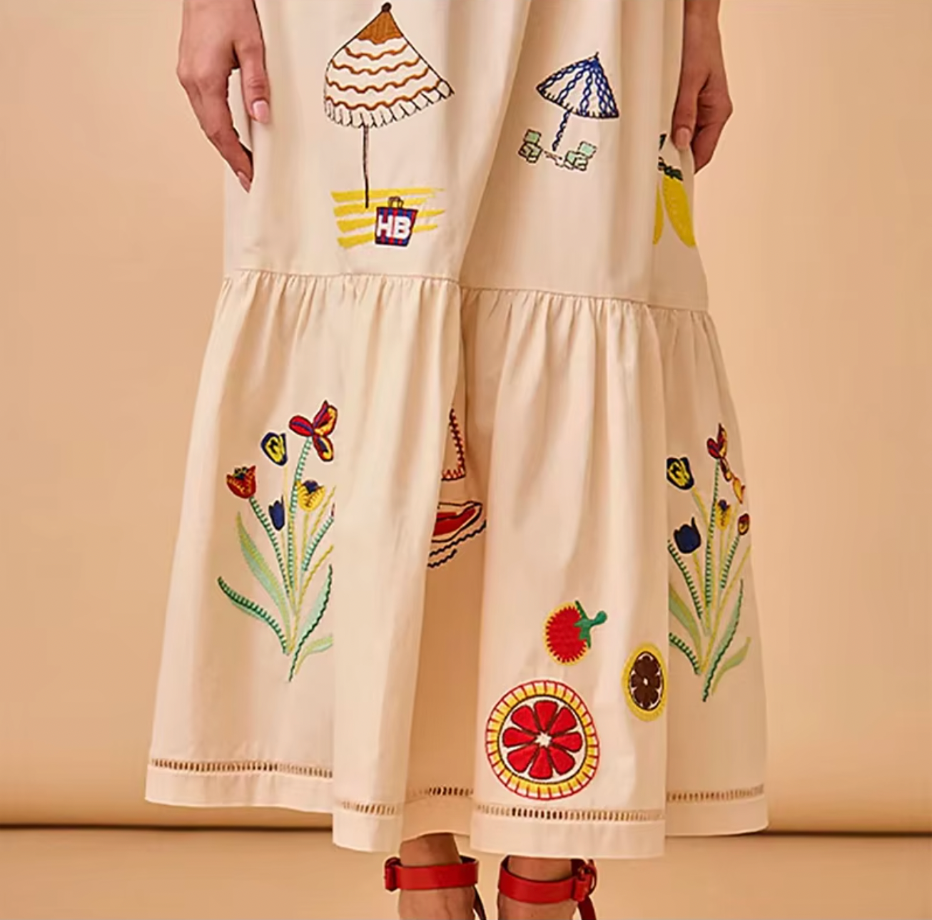 Sway with elegance in the Clara Maxi Dress. Its vibrant summer embroidery will steal the spotlight for any occasion. Simply add your own personal touch with accessories and let your fashion sense shine.