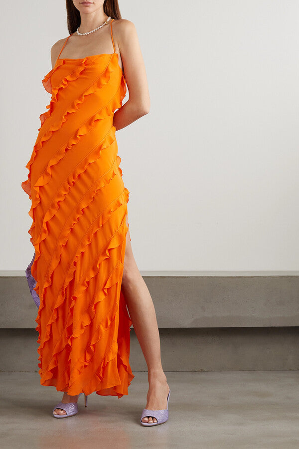 Expertly designed and crafted, the Elvire Maxi Dress from STAUD is a must-have for any fashion wardrobe. Made from lightweight crepe, this dress features diagonal ruffles that add a touch of femininity, while the open lace-up back and thigh-high slit provide a sultry and modern twist. Perfect for any occasion, embrace the stylish versatility of this dress.