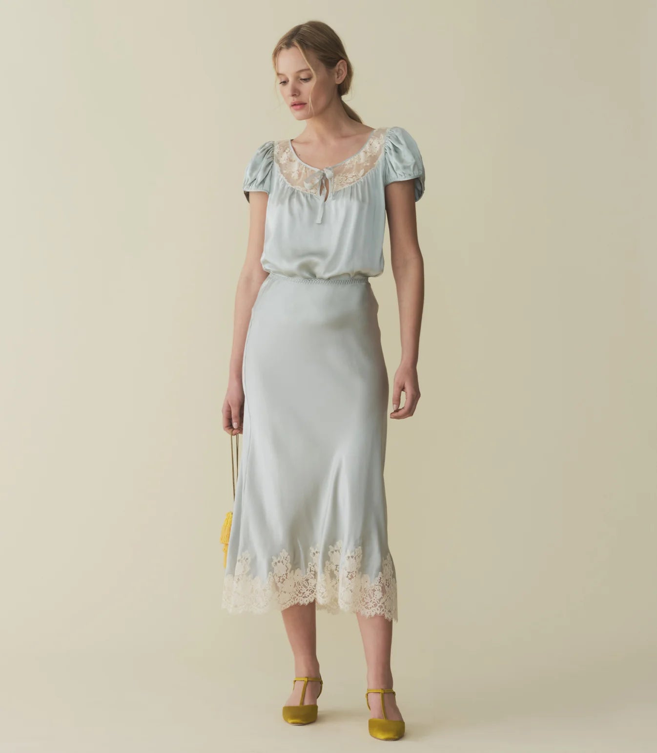 In buttery garment-washed silk satin, the Elowen Skirt is our take on a '90s-style slip skirt. Its high waist is trimmed in delicate scallop elastic, while a bias-cut skirt trimmed with intricate contrast lace falls to mid-calf.