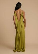 Load image into Gallery viewer, Looking for a dress that combines boldness and elegance? Look no further than the Odessa Dress! With subtle tucks at the side hip for structure and harmony, delicate spaghetti straps and a daring thigh-high slit, this dress is tailored to captivate. The asymmetrical deep V back and cascading satin details add the perfect finishing touches. Take a risk and stand out in the Odessa Dress.
