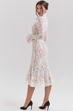 Load image into Gallery viewer, Get ready to turn heads with the Sophia Midi Dress. This dress combines modern flair and romantic elegance. Its body-hugging silhouette, high neck, and long sleeves beautifully highlight your shape while keeping it sophisticated. The ivory lace adds a touch of texture, and the fluted hem and cuffs add a playful twist to this timeless design.
