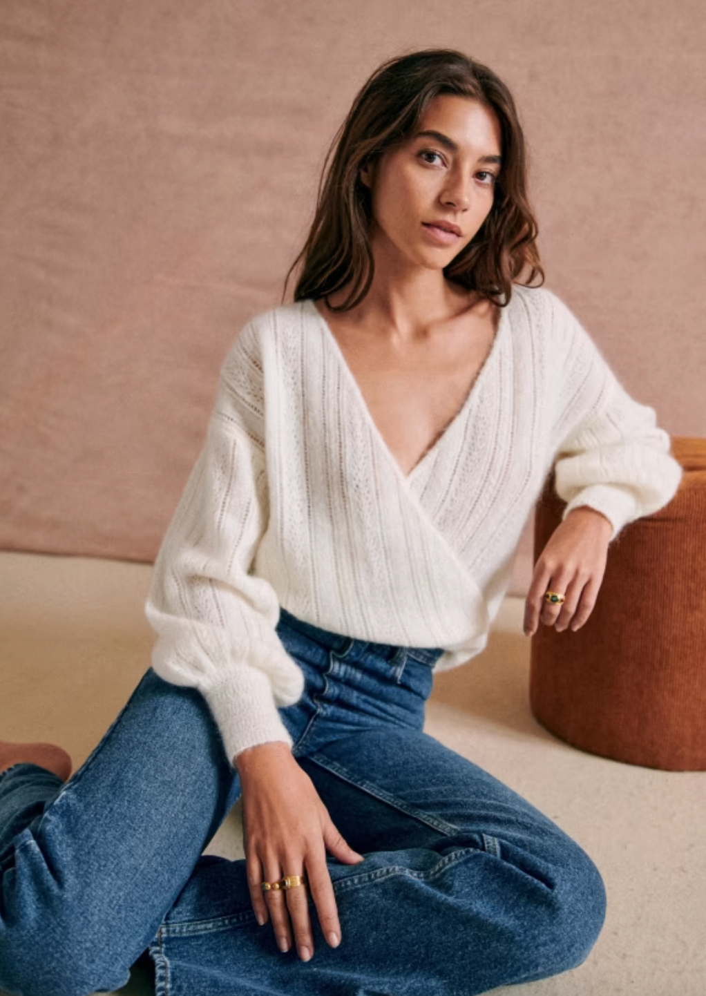 Stay cozy and stylish with the Cristina Jumper. Made from a luxurious blend of wool and kid mohair, this long-sleeved jumper features a fancy knitting technique and a unique covered heart shape. Its versatile V-neck design allows you to wear it with the opening in the front or back for added versatility.