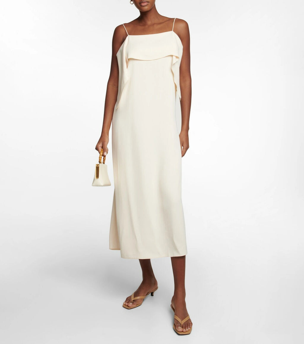 This slip dress from Toteme is made from supple twill. It has a straight silhouette, a draped and layered front with wispy shoulder straps, and a midi hem.