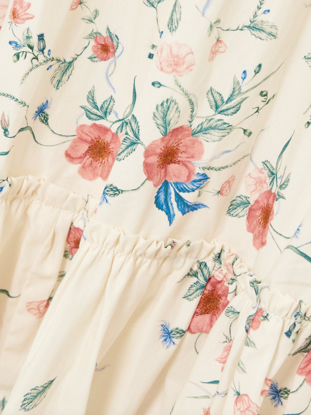 Crafted from breathable linen, the Consuelo Mosqueta Midi Dress from Agua by Agua Bendita features delicate embroidery of elegant blooms that enhance its refined aesthetic. Its flowing tiers offer effortless movement and a flattering silhouette, combining comfort with expert design that suits both casual and sophisticated occasions.