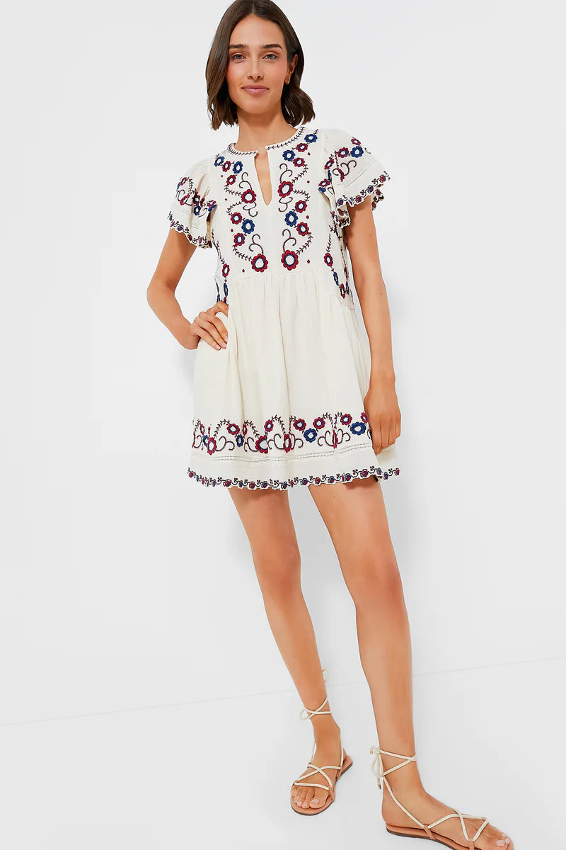 The Soren Embroidery Short Sleeve Dress by Sea New York features a split V-neckline and delicate embroidered detailing, combining elegance with effortless wearability. Its short flutter sleeves and gathered skirt create an A-line silhouette that offers a relaxed yet refined fit, ideal for versatile styling. In a cream multi palette, this mini dress balances romantic charm with modern ease, making it perfect for both casual days and more polished occasions. 