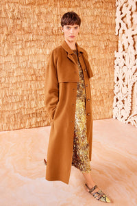 Stay warm and chic in the Romi Coat by Ulla Johnson. Crafted from luxurious double-faced wool blend with a touch of cashmere, this Flora pink coat features a longline silhouette, storm flap overlay, and a single-breasted design. Complete with side pockets and a removable belt to accentuate your figure.