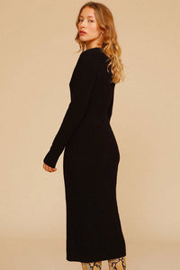 Experience effortless chic this autumn and winter with our Ines Midi Dress. Made from high-quality rib knit fabric, this vintage cutout dress features a figure-hugging silhouette, cascading cut-outs with bows, and a crew neckline. Perfect for work from home or dressing up on off-duty days. Complete the look with mid-calf heeled boots and a snakeskin baguette bag.