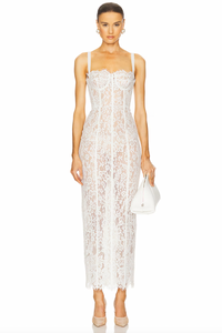 The Lace Column Dress by Helsa combines refined craftsmanship with daring elegance. Its delicate bustier and adjustable shoulder straps allow for a tailored fit, while the unlined, sheer fabric provides breathable comfort and a subtle reveal beneath. Featuring a hidden back zipper, this dress maintains a seamless silhouette, making it an ideal choice for sophisticated occasions where understated allure is key.