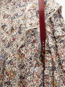 Step into the free-spirited 70s with the Reign Ruffled Paisley-Print Blouse! Adopted by icons like Janis Joplin and Jimi Hendrix, this Isabel Marant Étoile blouse exudes bohemian charm with its multicoloured paisley pattern. Lightweight poplin and delicate lace-trimmed ruffles add a feminine touch. Pair with tailored trousers for a stylish contrast.