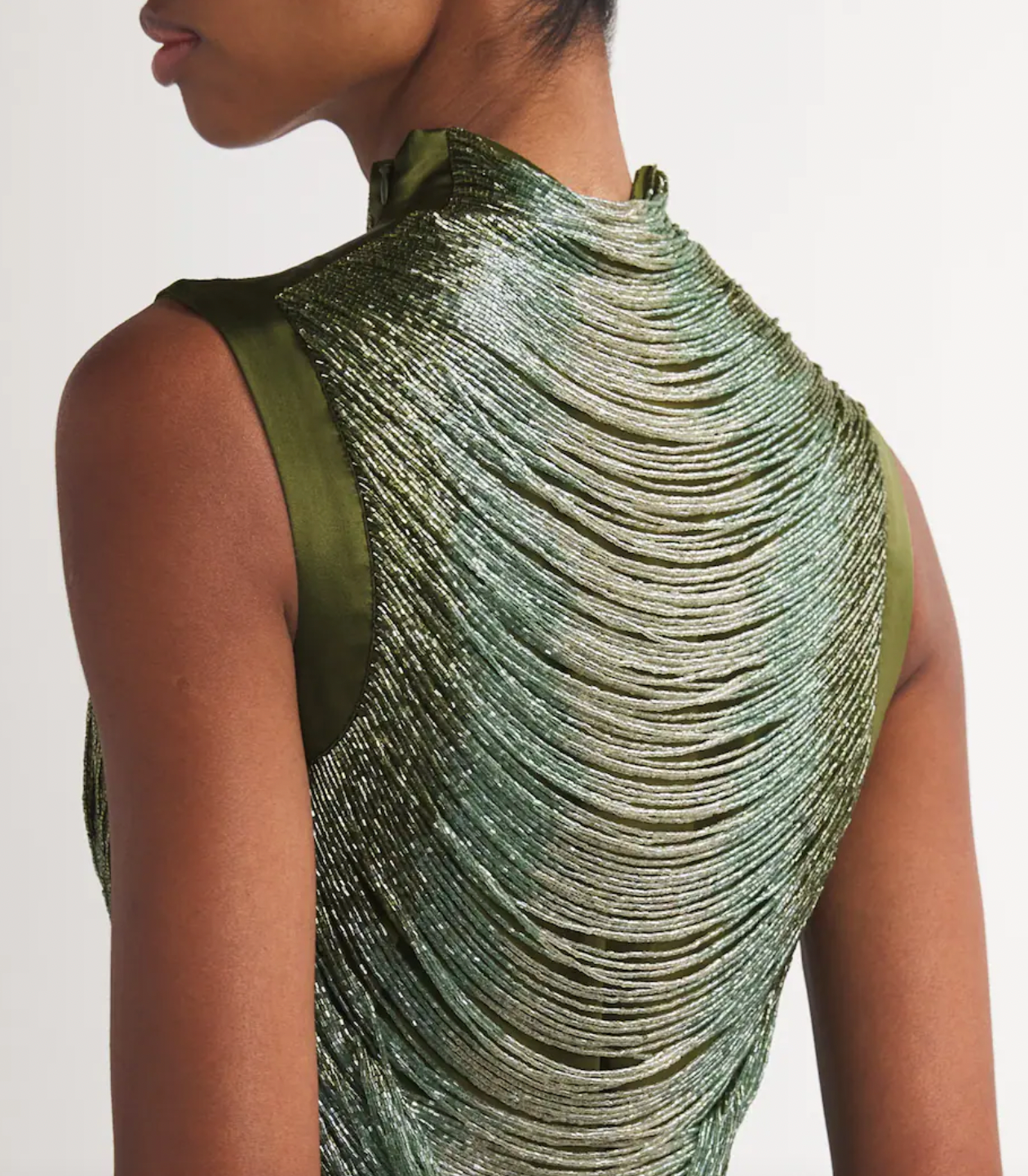 Elevate your wardrobe with the Multi Beaded Taraji Blouse by Cult Gaia, featuring exquisite hand-beaded arcs that highlight Cult Gaia’s commitment to artisanal excellence. The cedar-toned, stretchy side panels ensure a flattering fit while adding subtle contrast. Perfectly paired with the matching Chantel skirt, this blouse transforms any look with its intricate detailing and luxurious craftsmanship.