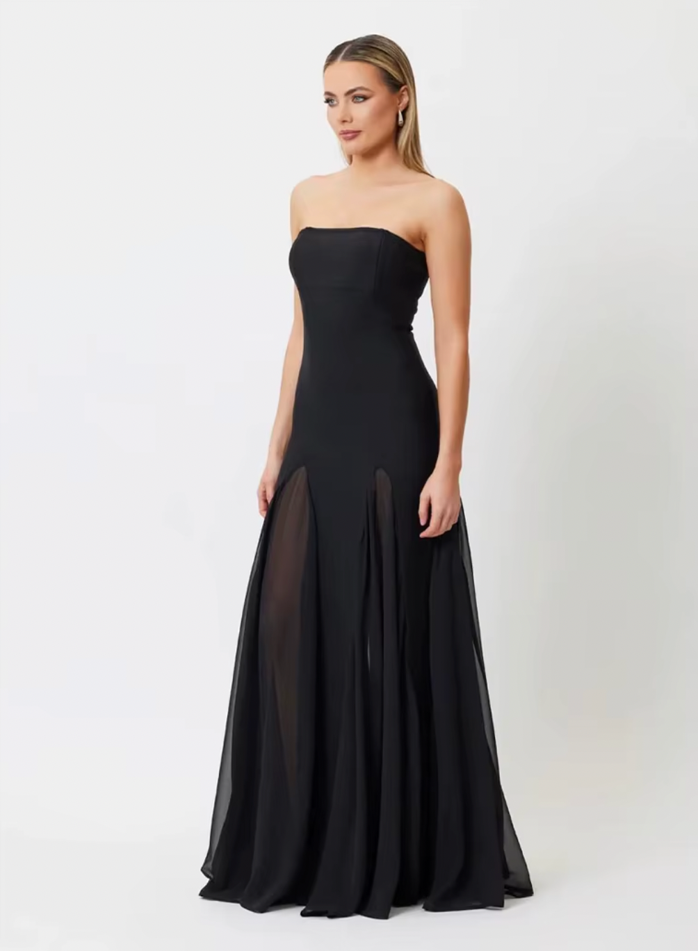 Introducing the Bridget Maxi Dress - the perfect blend of sophistication and comfort. Crafted with our premium crepe knit and chiffon materials, this strapless dress boasts a graceful maxi length and dynamic mesh panels for fluid movement. Featuring a convenient centre back zip closure, it's the ideal option for any event.