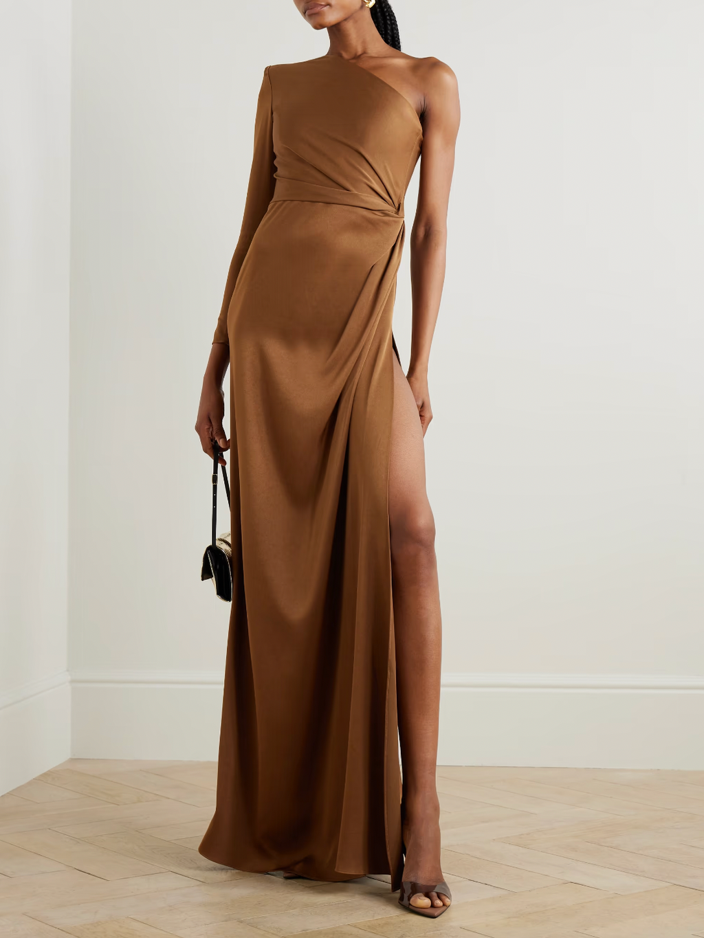 Elevate your special occasion attire with this Alex Perry one-shoulder gown. Crafted from luxurious satin-crepe, the dramatic silhouette is enhanced with a gathered detail and asymmetrical design. Perfect for formal events, pair with statement jewelry for a complete look.