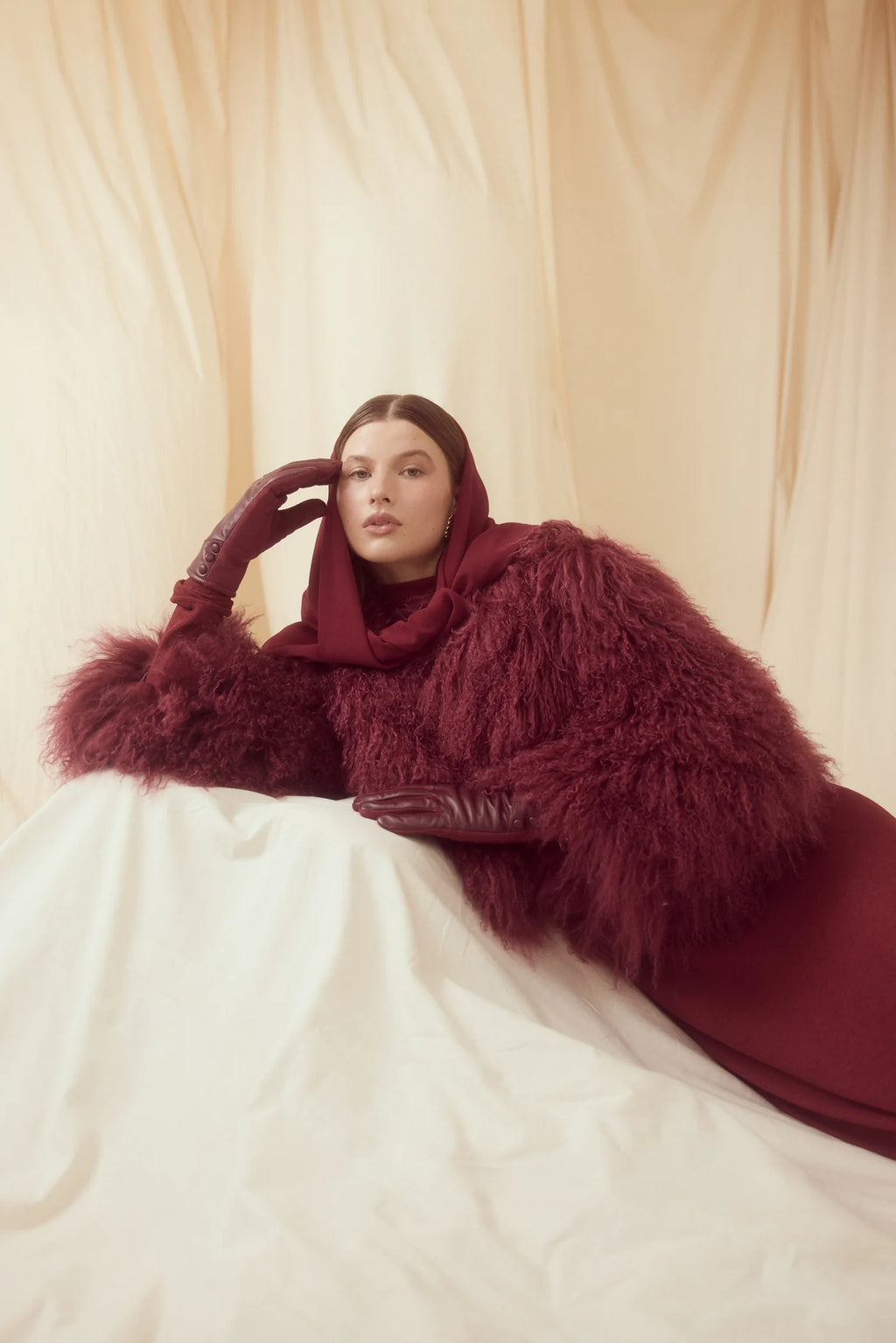 Elevate your wardrobe with the Georgina Jacket in Cherry, crafted from 100% luxurious Mongolian lamb fur. This jacket combines exceptional warmth with refined style, featuring sleek concealed fastenings for a seamless, sophisticated look. Perfect for making a confident statement, the Georgina Jacket adds an irresistible edge to any outfit.
