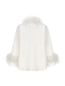 Experience unparalleled elegance and warmth with the Angelica Coat. Made from sumptuous ostrich wool, its flattering A-line shape ensures comfort and style during colder days. Eye-catching fur details on the sleeves and neckline add a luxurious edge, while custom silver buckles offer a refined, exclusive touch. This coat is the perfect choice for those who want to stay chic and cozy all winter long.