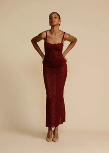 Elevate your evening look with Margot Lace Dress. This vintage-inspired lace dress in deep Wine exudes seductive allure and classic glamour. Featuring a semi-sweetheart neckline and a floor-length maxi with a center back split, Margot compliments your curves and allows for custom adjustments with gold fastenings on the shoulder straps. Lined at the bust for coverage and support, Margot is the perfect blend of comfort and sophistication.