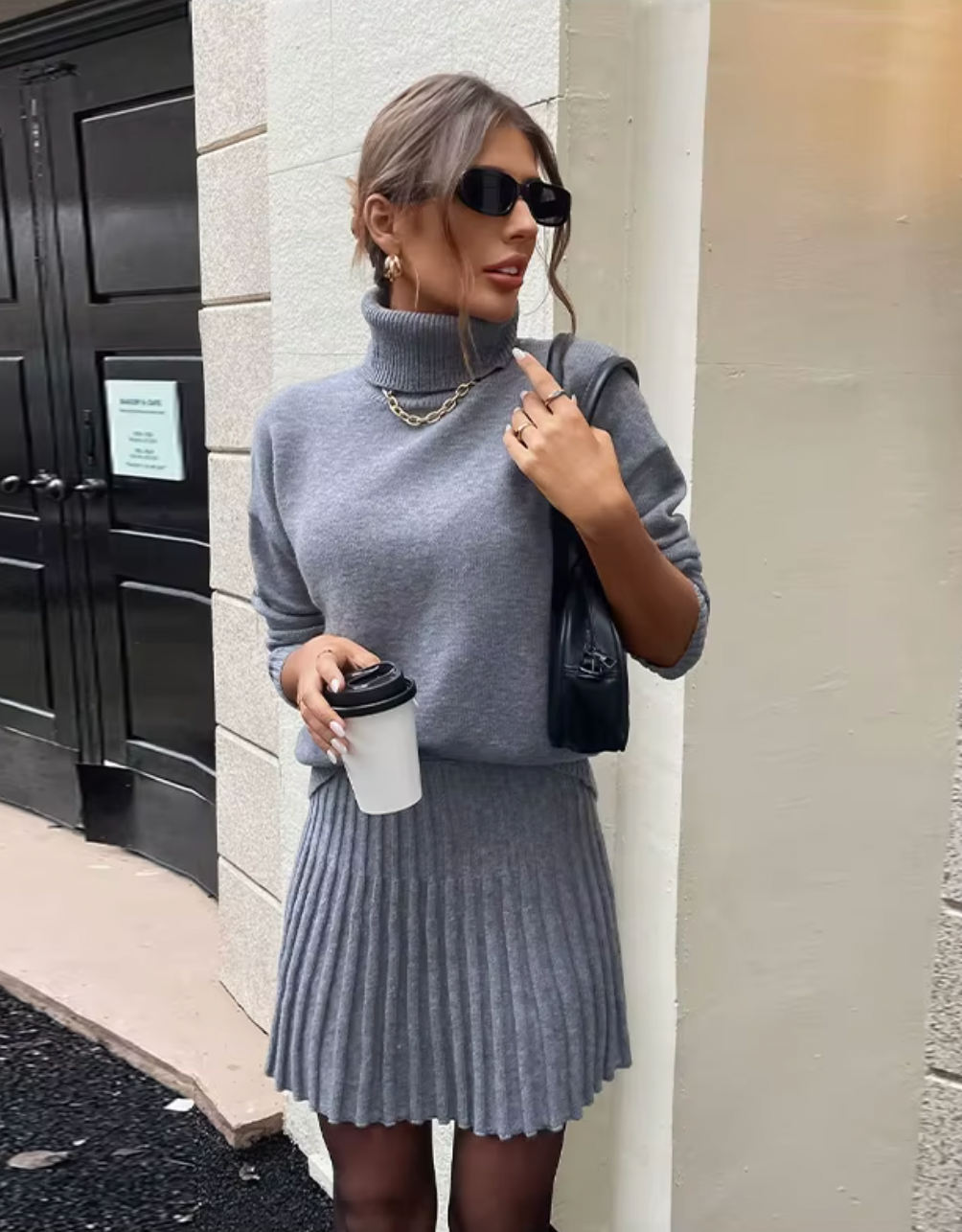 Indulge in luxury with the Margot Knit Blend Set. Elevate your style with this high collar, solid color pullover set for women. The long sleeve combines effortlessly with the elegant casual skirts for a refined and sophisticated look.