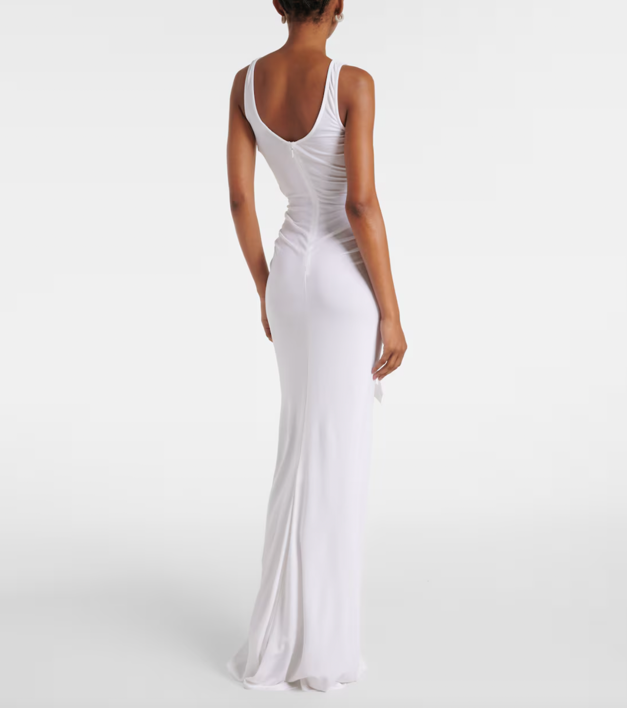 The Salacia Draped Jersey Maxi Dress by Christopher Esber epitomizes modern sophistication through its masterful construction. This luxurious jersey piece showcases architectural draping that sculpts an elegantly fluid silhouette, designed to complement and enhance every figure. The seamless marriage of premium comfort and high-fashion craftsmanship makes this dress an essential investment—equally stunning for refined daily elegance or unforgettable special moments. 