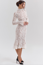 Load image into Gallery viewer, Get ready to turn heads with the Sophia Midi Dress. This dress combines modern flair and romantic elegance. Its body-hugging silhouette, high neck, and long sleeves beautifully highlight your shape while keeping it sophisticated. The ivory lace adds a touch of texture, and the fluted hem and cuffs add a playful twist to this timeless design.
