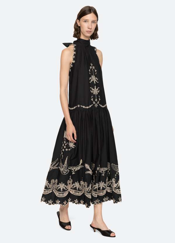 Elevate your wardrobe with the Kingsley Embroidery Tank Dress by SEA NY, designed to combine elegance and ease. Featuring intricate embroidered details, a high neckline, and a charming back bow tie, this dress offers a sophisticated silhouette. The scalloped hemline adds a delicate finishing touch, while the button back closure ensures a relaxed and comfortable fit. Perfect for any occasion, Kingsley blends timeless style with effortless charm.