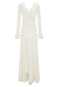 The Electra Maxi Dress combines elegant lace and a flattering fitted silhouette to create a captivating look. Its deep V lace neckline and delicate cut-outs add a touch of allure, while the cascading front-side tie drape enhances graceful movement. Flared layered sleeves bring a vintage charm, and the partial lining ensures comfort without compromising style. Perfect for making a memorable impression at any evening event, this dress shapes a sophisticated and sultry statement.