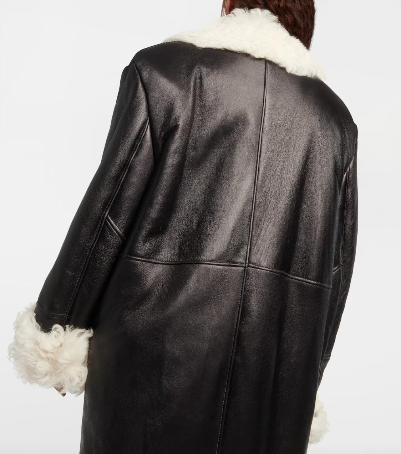 Indulge in luxury with the Magda Butrym Shearling-lined leather coat. Made with premium quality leather and lined with soft shearling, this coat offers both style and comfort. Perfect for chilly winter days, it is a must-have addition to your wardrobe. Elevate your fashion game with this sophisticated and exclusive piece.