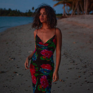 Indulge in the drama of the Casablanca Maxi Dress. Its sleek silhouette and oversized print will turn heads, while the sheer finish adds a touch of allure. Cut on the bias, it molds to your body for a flattering draped effect. A must-have for an effortlessly sophisticated look.