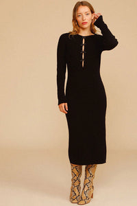 Experience effortless chic this autumn and winter with our Ines Midi Dress. Made from high-quality rib knit fabric, this vintage cutout dress features a figure-hugging silhouette, cascading cut-outs with bows, and a crew neckline. Perfect for work from home or dressing up on off-duty days. Complete the look with mid-calf heeled boots and a snakeskin baguette bag.