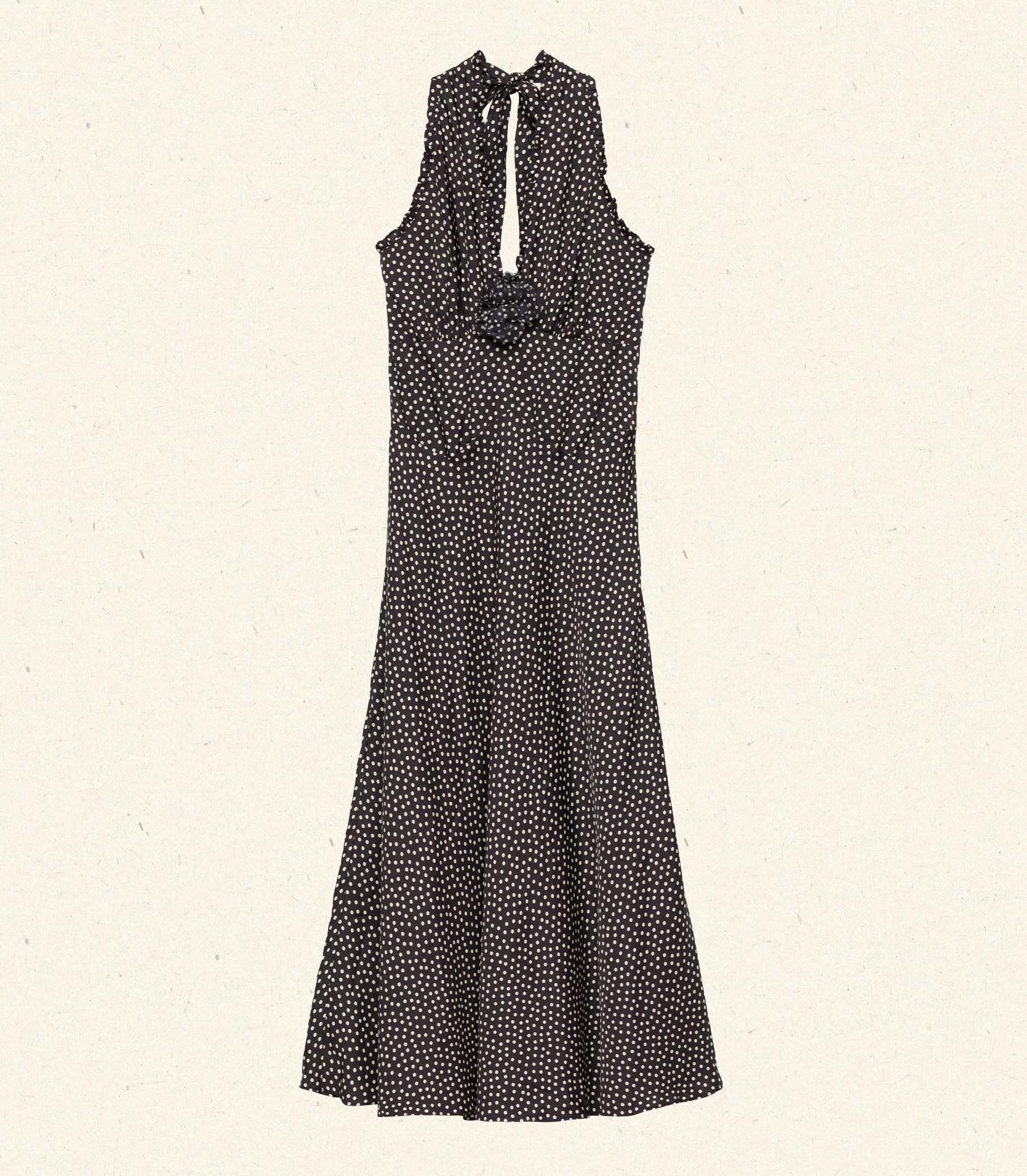 The Mazarin Dress - Camille Dot by Doen captures subtle 1990s sophistication through its luxurious silk-viscose blend and elegant halter neckline accented with fine ruffles. Designed with a fitted bodice and an invisible side zipper, it ensures a smooth, tailored silhouette. A removable silk georgette rosette brooch adds an element of adaptable refinement, perfect for elevating your wardrobe with timeless grace.