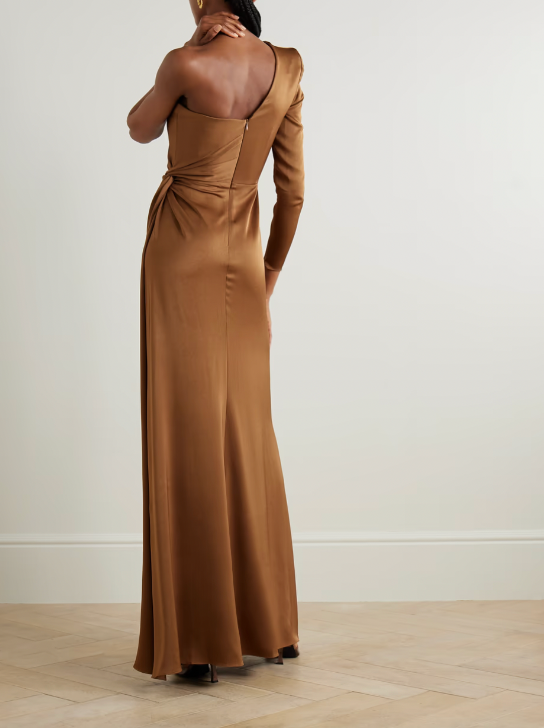 Elevate your special occasion attire with this Alex Perry one-shoulder gown. Crafted from luxurious satin-crepe, the dramatic silhouette is enhanced with a gathered detail and asymmetrical design. Perfect for formal events, pair with statement jewelry for a complete look.