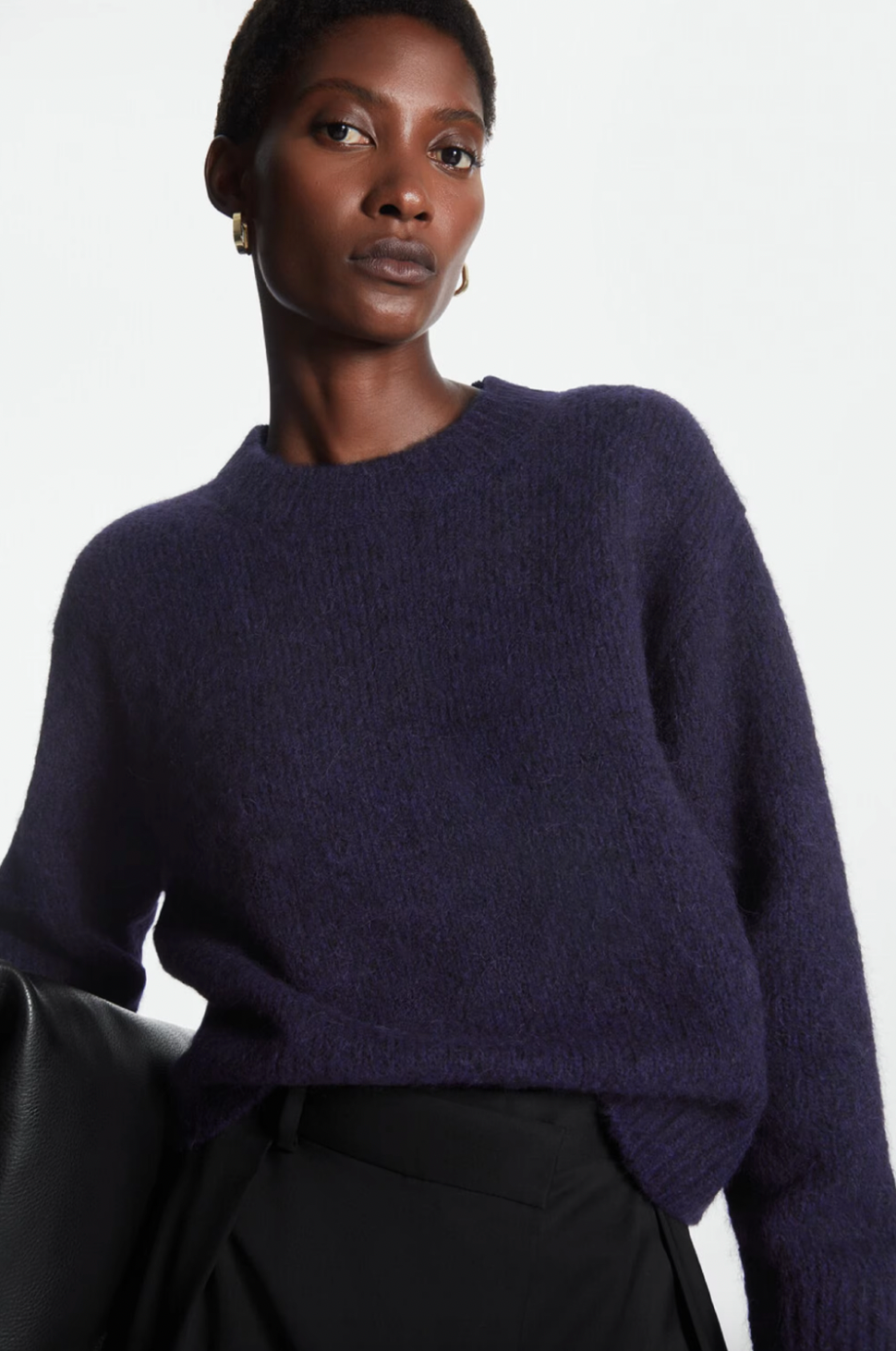 Introducing the Alpaca Wool-blend Sweater: a bold and daring winter style that will keep you warm and on-trend. Made with a cozy blend of alpaca wool, this crewneck sweater is perfect for casual outings and adds a touch of adventure to any outfit. Don't miss out on this must-have piece for the season!