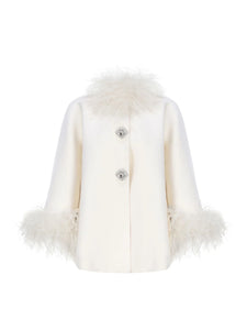 Experience unparalleled elegance and warmth with the Angelica Coat. Made from sumptuous ostrich wool, its flattering A-line shape ensures comfort and style during colder days. Eye-catching fur details on the sleeves and neckline add a luxurious edge, while custom silver buckles offer a refined, exclusive touch. This coat is the perfect choice for those who want to stay chic and cozy all winter long.